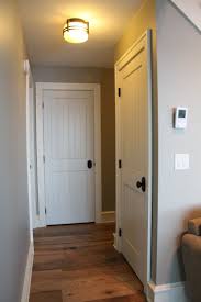 Although new wood doors are sold unfinished and must be. Interior Doors Sleek Cottage Style With White Molded Plank Doors Bayer Built Woodworks Farmhouse Interior Doors Doors Interior Cottage Style Interiors