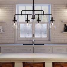 Sea Gull Lighting Belton 40 75 In W 4 Light Heirloom Bronze Kitchen Island Lights 6614504 782 The Home Depot Kitchen Island Lighting Kitchen Lighting Fixtures Kitchen Island Chandelier