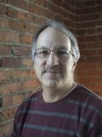 A two-tiered economy? Slower growth? AI bubble? Three Spokane economists  hash out the possibilities.