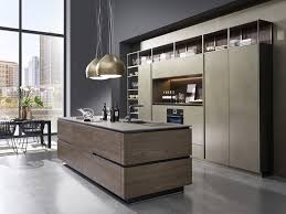The white cabinets look so much fresher than the former wood material in this kitchen from elements of style. The Kitchen Feeling