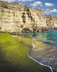 Papakolea beach aka green sand beach is situated in a bay cut into a side of a cinder cone that erupted thousands of years ago. Top 5 In Hawaii 3 Green Sand Beach