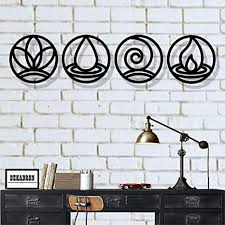 Lagabe this wall and base unit combo is mounted against a wood panel backdrop, which visually holds the entire arrangement together. Amazon Com Dekadron Metal Wall Art Four Elements Metal Wall Decor Home Decor Interior Decoration Metal Sign Black Home Kitchen