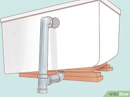 Thread the linkage through the overflow hole if you have a lever drain. How To Install A Bathtub With Pictures Wikihow