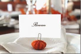 Craft these easy diy place card holders and fall table decorations to designate spots at the thanksgiving dinner table. 5 Minute Craft Mini Pumpkin Place Card Holders Setting For Four