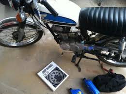 Understanding the numbers on a bottle of motorcycle engine oil. Change The Oil In A Vintage Honda Cb100 13 Steps With Pictures Instructables