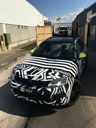 Black And White Camouflage Car Dazzle Dazzle Camo Wrap By John Croston Vehiclewrapsaus Dazzle Camouflage Camo Wraps Vans Camo