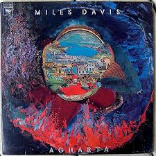 Ashley kahn holding up a rolling stone cover that featured miles davis. Miles Davis Album Cover Art Top 20 Miles Davis Album Covers Album Cover Art Miles Davis Album Covers