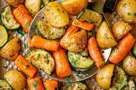 Roasted potatoes, zucchini, onions & pancetta. Garlic Herb Roasted Potatoes Recipe With Carrots And Zucchini Roasted Vegetables Recipe Eatwell101