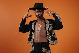 I already got @pneumismatist to translate the greek on the tree for me, it's then after their nature was cut in two, each yea. Lil Nas X Joins Forces With Taco Bell For Album Montero Los Angeles Times