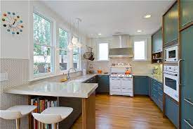 The kitchen features granite counters, thermador 6 burner gas oven/range, stylish backsplash, breakfast bar and built in refrigerator. Magnificent Kitchen Backsplash With White Cabinets Designing Tips Stainless Steel Hood And Penny Round