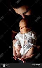 Download the above black father and son relationship background image and use it as your wallpaper, poster and banner design. Father Holding His 15 Image Photo Free Trial Bigstock