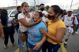 The relatives of prisoners gather outside turi jail where an inmate riot broke out in cuenca, ecuador february 23, 2021. Toll Climbs In Ecuador Prison Riot Massacre World The Jakarta Post