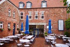 The area's natural beauty can be seen at lower saxony wadden sea national park and national park center seehundstation, while kunsthalle emden and bunkermuseum are cultural highlights. Greetsiel Krabben Kutter Bunte Fischerdorf Idylle Auf Der Krummhorn Passenger On Earth