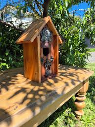 A spadger house made from mahogany and pine from a dresser I destroyed.  Oiled, water and weather proof. Comes apart for cleaning. I can deliver