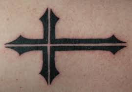 Cross tattoo on ankle is usually black or not colored just the border is drawn as the tattoo is small and there is no space for colors. Black Simple Cross Tattoo Design By Notacamouflagesoul