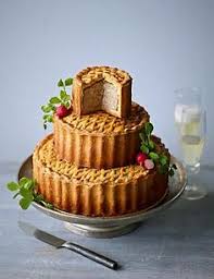 Alternative Wedding Cake A Three Tier Pork Pie By Marks And Spencer Pie Wedding Cake Unusual Wedding Cakes Savoury Cake