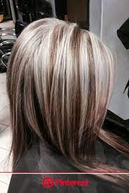The brown and dark blonde shades come together in a wonderful mixture that shines with ashy tones. 20 Types Of Platinum Blonde And White Hair Blonde Highlights On Dark Hair Hair Styles Brown Blonde Hair Clara Beauty My