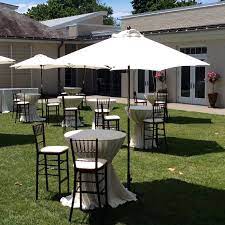Cocktail table with spandex and umbrella $ 94.50. Market Umbrellas 9 Partysavvy Event Rentals Pittsburgh Pa