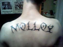 Tribal tattoos have a bold visual appeal: 66 Cool Lettering Tattoos For Back
