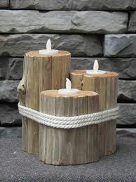 As an alternative to the first suggestion in this list, which uses birch logs standing vertically, you can cut them into the end result is a candle holder that almost mimics the look of some pieces of a birch tree that has fallen naturally. Bois Flotte Deco Bougies Mur De Pierre Diy Candle Holders Diy Candles Wooden Candle Holders