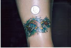 Koi fish tattoos meaning is as wonderful and varied as the legend they represent. Small Koi Fish Armband Tattoo Tattooimages Biz