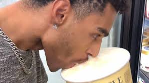 US man filmed licking ice cream
