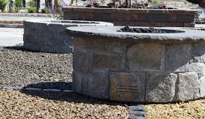 Crafted from magnesium oxide with a steel and stone finish for that rustic look of aged, stacked this rustic stone fire pit includes a tank hideaway table and a natural gas conversion kit. Choosing A Stone Firepit 4 Factors To Consider Haynes