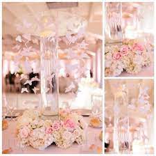 This is a great theme to decorate for. New Beginnings Flowers And Playful Colors A Spring Themed Quinceanera Quinceanera Quinceanera Decorations Quince Decorations Butterfly Theme Party