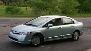 A honda civic hybrid car and its displayed engine, left, are seen at an event in new delhi, india, on june 18, 2008. Honda S Fix For Prematurely Dying Civic Hybrid Batteries Hurting Fuel Economy Performance Autoblog
