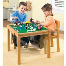 Imaginarium wooden table and 2 chair set table comes in espresso finish with real wood veneer, has 2 sturdy chairs with vanilla accents. Imaginarium Lego Table With 2 Chairs Imaginarium Toys R Us Big Gifts Lego Table Toy Store