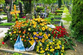 Small gift or photograph to put in the coffin. Grave Blankets A Warm Tradition St Charles Monuments