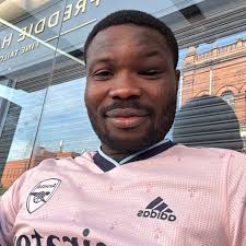 Arsenal fans holding their banner 'vamos' the wrong way round before the  game tonight.