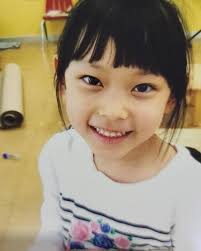 New baby Haerin photo 💚 Look at that toothy smile