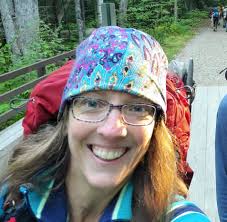 Someone's little lost their hat! Looks homemade. On the walking trail just  past the water center, hung it in the tree