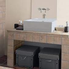 Soft peach backsplash and brown accent walls exhibit a tranquil atmosphere. 11 Tile Counter Ideas For Kitchens And Baths