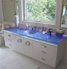 Curava offers beautiful, bold and unique surfaces that elevate the look of a room with a wow factor. Custom Glass Vanity Top With Integrated Sink Sinksgallery Glass Countertops Glass Sink Glass Vanity