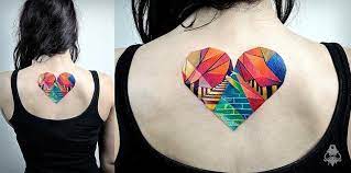 This tattoo is an expression of love for the love itself. Geometric Colorful Heart Tattoo Hearttattoo Graphictattoos Breakone Bestgeometrictattoos Abstract Tattoo Tattoos Geometric Tattoo
