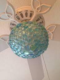 Share this other interesting things about ceiling ideas photos. Turquoise Aqua Ceiling Fan Light Globe After Diy Makeover With Aqua Glass Pebbles From The D Ceiling Fan Makeover Ceiling Fan Globes Ceiling Fan Light Globes