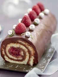 Une Buche Au Chocolat Framboises Noix De Coco Et Citron Recette Chocolat Framboise Buche Chocolat Framboise Biscuit Coco