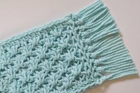 A small mat that holds a cup and a snack. Tunisian Pyramid Lace Stitch Mug Rug Exclusive Pattern Allfreecrochet Com