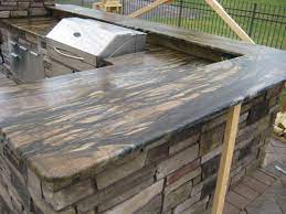 Here are six affordable outdoor kitchen design types and which stone countertop material to use to ensure your kitchen remains. Outdoor Kitchen Best Countertop Material Goq Countertops Omaha