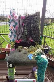 Yarn Bombed Spring Garden Chair Made By Carse Crafters Scotland Yarn Bombing Knitted Flowers Fabric Flowers