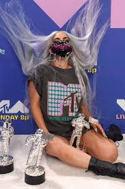 Check out all of lady gaga's looks (and masks) from the 2020 mtv video music awards, by clicking through the slideshow ahead. Lady Gaga Posed With Her 5 Moon Person Trophies In A 90s Inspired Mtv Logo Tee Lady Gaga Photos Lady Gaga Pictures Lady Gaga Joanne