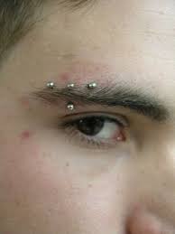 42 Really Cool And Stylish Eyebrow Piercing Ideas Eyebrow Piercing Eyebrow Jewelry Gold Bar Earrings