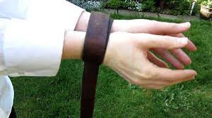 Bend it back on itself and thread it through the top again to form the second loop, i've lifted the tail end of the belt to show where it is. Secure Emergency Handcuffs Youtube