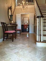 Waterproof options are also a good idea to prevent floor failures from splashes and spills. Tile Flooring First Impressions Start With The Foyer Foyer Flooring Entryway Tile Floor Entryway Tile