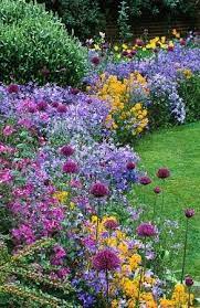 The perfect flower garden border. Perennial Border Tips For Making Your Garden More Interesting Garden Beautiful Flowers Garden Garden Plants