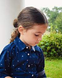 You can deck the bun with a cute bow and a matching dress. Boys With Long Hair Long Hair Boy Long Haired Little Boy Boys Long Hairstyles Boy Hairstyles Baby Boy Hairstyles