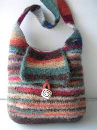 This simple purse is designed like a small tote with a sliding infinity loop for closure. Crochet And Felt Pattern Most Practical Felted Wool Handbag Includes Felting Instruction Includes Free Bonus Rose Pattern Wool Bags Felt Bag Recycled Sweaters
