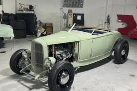 Image result for Scaraba Green 1930 Oldsmobile